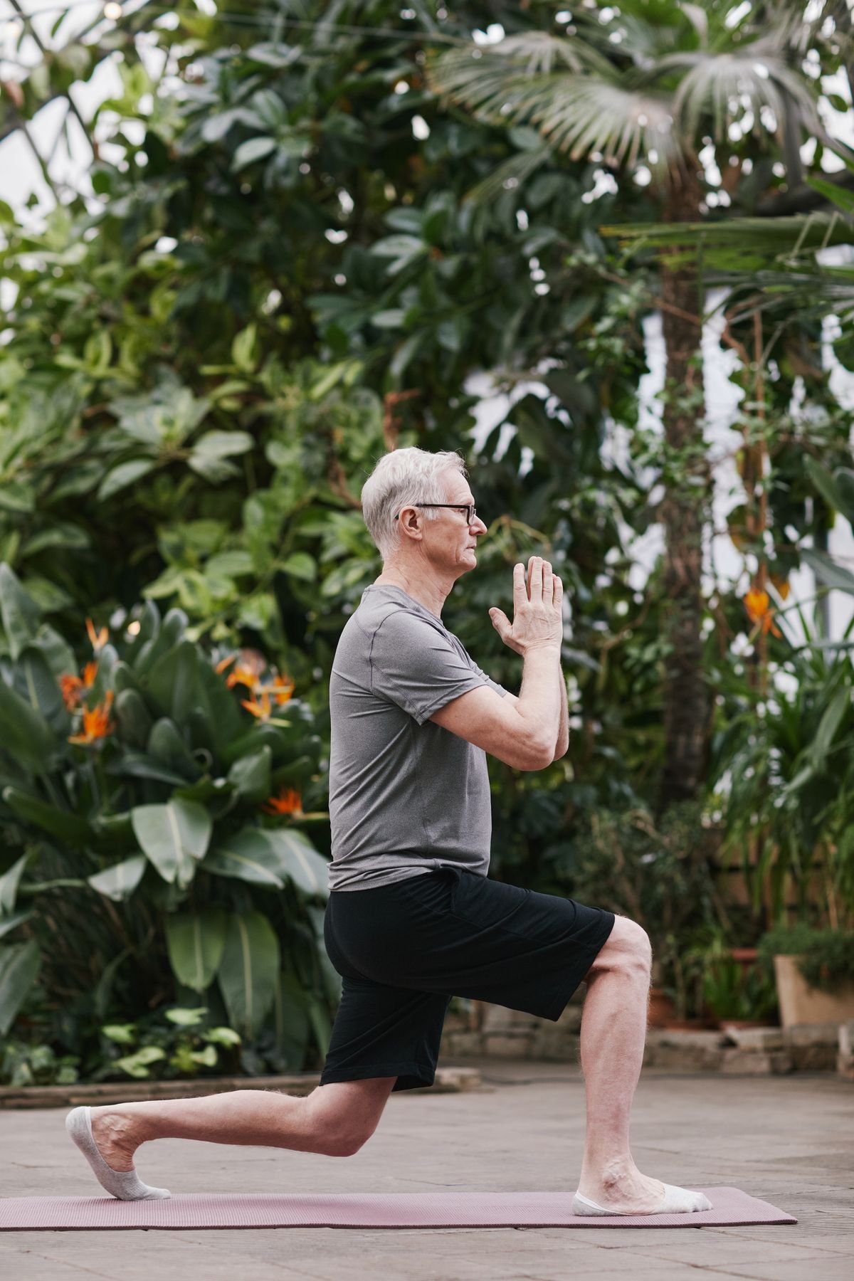 Elder person practicing yoga for longevity and wellness